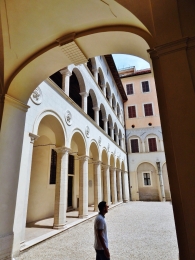 A multi-arched Roman courtyard.