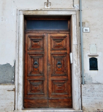 A dark wise door in Porto Santo Stefano.