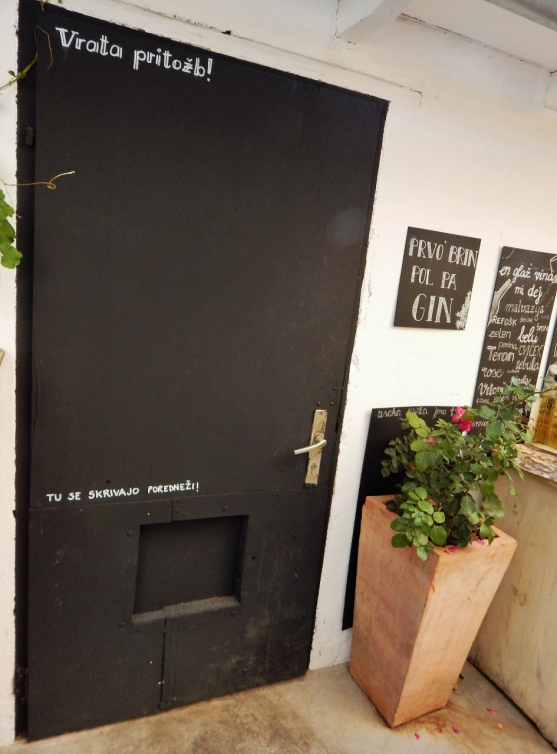 The Door of Complaints in Slovenian House Figovec restaurant. No wonder it's empty. Right: "From juniper to gin." Bottom: "The hideout of the naughty ones."